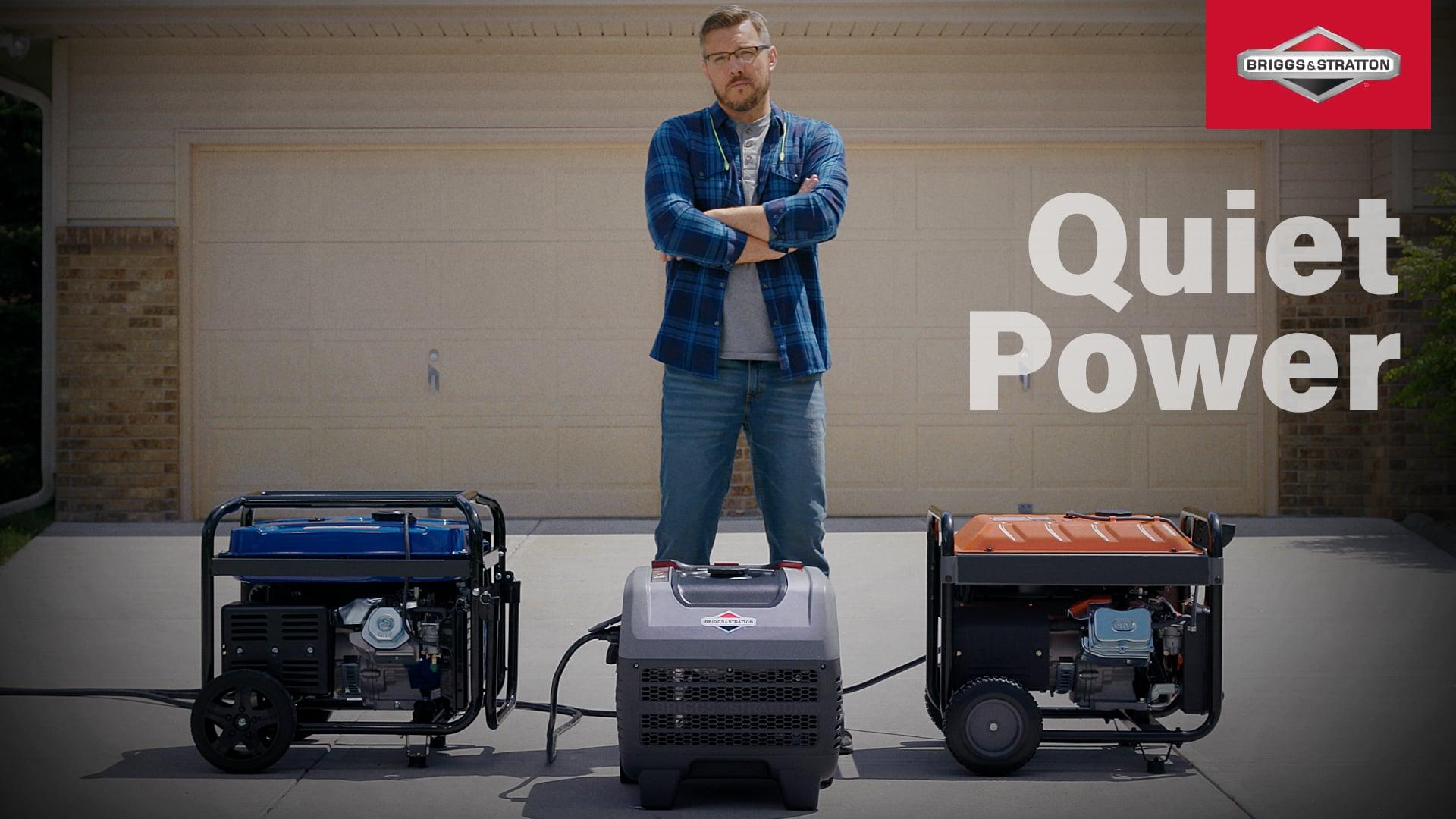 man standing with 3 generators
